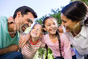 Happy family enjoying in park