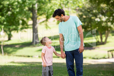 Father and son enjoying together in park