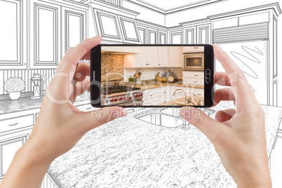 Hands Holding Smart Phone Displaying Photo of Kitchen Drawing Be