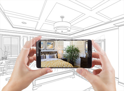 Hands Holding Smart Phone Displaying Photo of Bedroom Drawing Be
