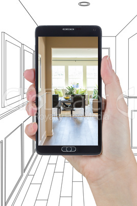 Hand Holding Smart Phone Displaying Photo of House Hallway Drawi