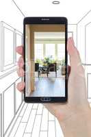 Hand Holding Smart Phone Displaying Photo of House Hallway Drawi