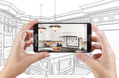 Hands Holding Smart Phone Displaying Photo of Kitchen Drawing Be