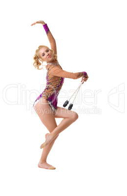 Young slim gymnast with a mace artistic portrait