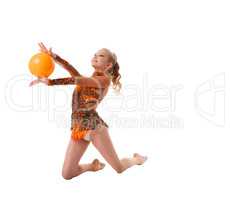 Young slim gymnast with yellow ball studio shot