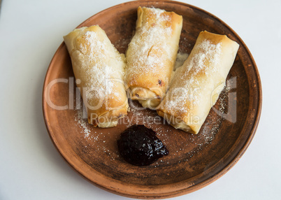 Rolled pancakes with cottage cheese .