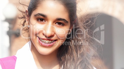 Pretty Teen Girl Smiling With Braces