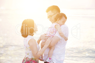 Family enjoying summer vacation at seaside