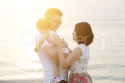 Family enjoying summer vacation at beach