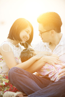 Family enjoying outdoor sunset