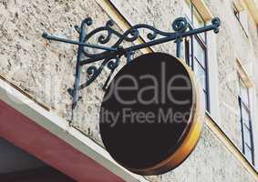 Blank rounded outdoor business sign