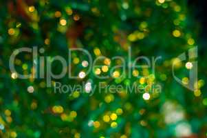 Green abstract background with yellow bokeh