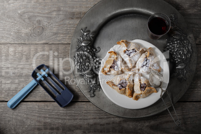 Jewish Pastry Hamantaschen and ratchet for Purim