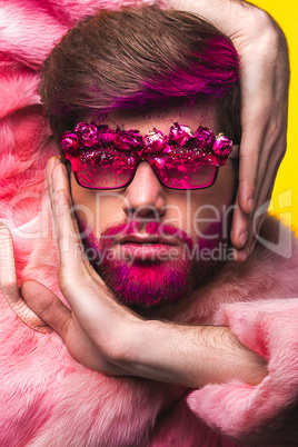 Man in a Pink Fur Coat and Carnival Glasses