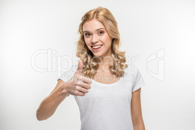 Woman showing thumb up