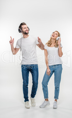 Young couple in headphones