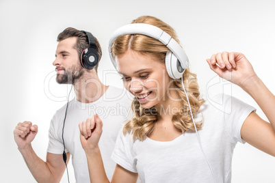 Young couple in headphones