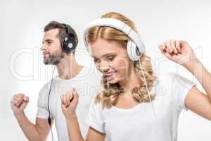 Young couple in headphones