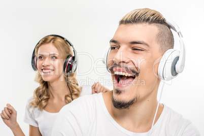 Young couple in headphones