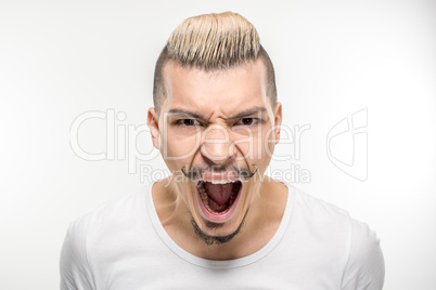 Young man screaming