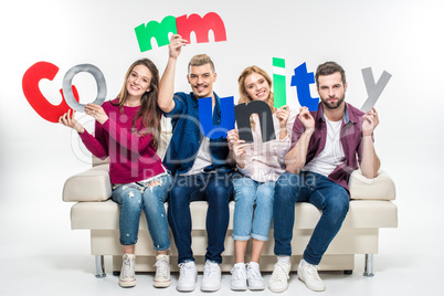 People holding community word