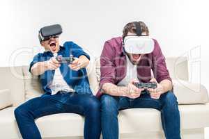 Friends in virtual reality headsets