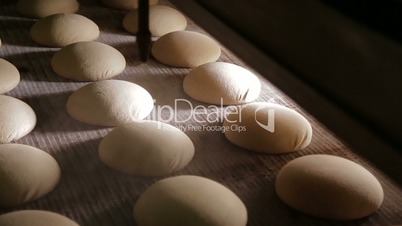 Making a loaf of bread in the bakery