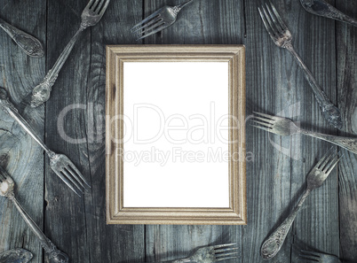 Empty wooden frame on the gray wooden surface