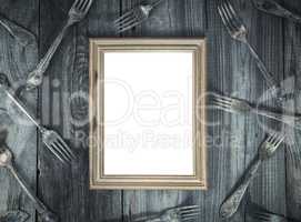 Empty wooden frame on the gray wooden surface