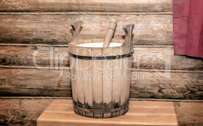 Barrel for water in a wooden sauna.