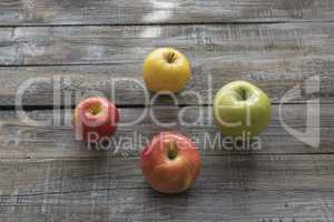 Organic apples on wooden boards background. Autumn concept