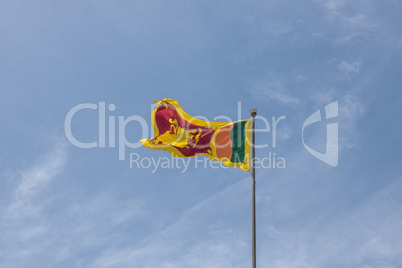 Sri Lanka flag on blue sky background