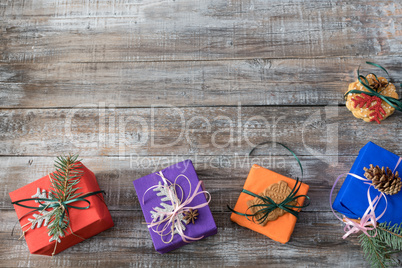 Christmas decorations on a wooden background, top view with cop