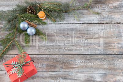 Christmas decorations on a wooden background, top view with copy