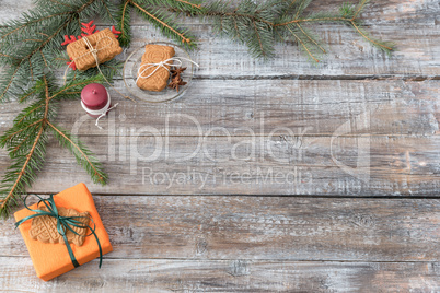 Christmas decorations on a wooden background, top view with copy