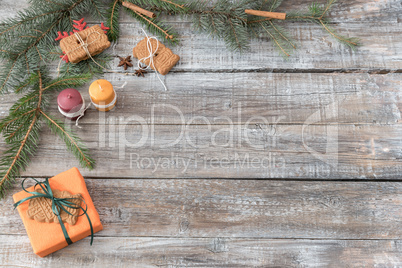 Christmas decorations on a wooden background, top view with copy