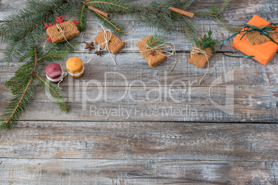 Christmas decorations on a wooden background, top view with copy