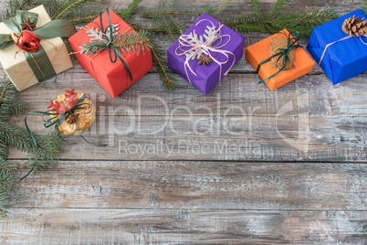 Christmas decorations on a wooden background, top view with copy
