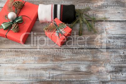 Christmas decorations on a wooden background, top view with copy