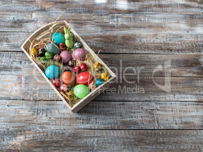 Easter Painted Eggs on wooden background