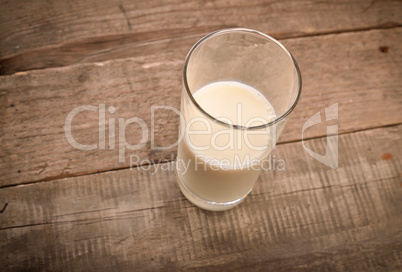 Fresh milk on wood