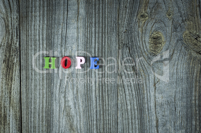 Words of hope from small multi-colored wooden letters