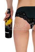 Woman in panties with wine bottle.