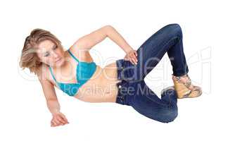 Woman in bra lying on floor.