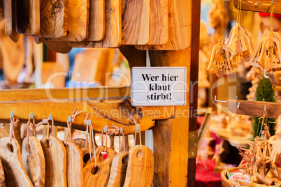 Wooden kitchen accessories shop at the Christmas market in Hamburg