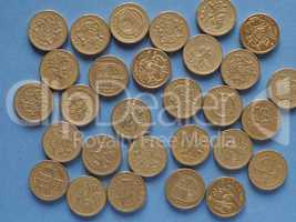 Pound coins, United Kingdom over blue