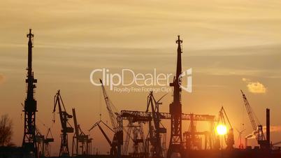 Timelapse of container harbor in Hamburg at sunset