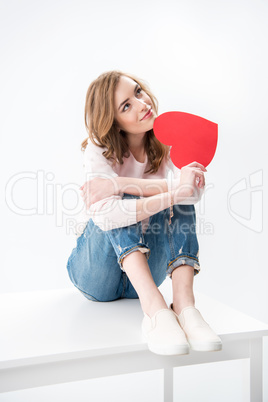 Woman with paper heart