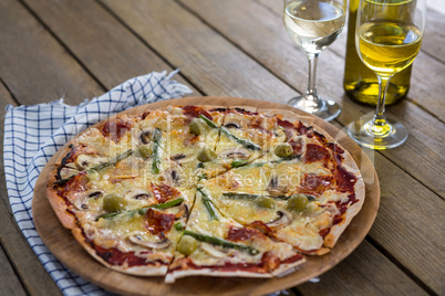 Italian pizza served on a pizza tray