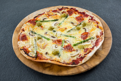 Italian pizza served in a pizza tray